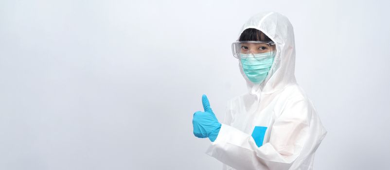 Woman doctor in PPE or personal protection equipment suit and medical mask and glove for protect corona virus or covid-19 and studio shot on white background and copy space