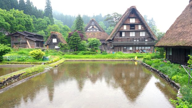 Shirakawa-go village in the rainy day and old vintage style house in Japan.