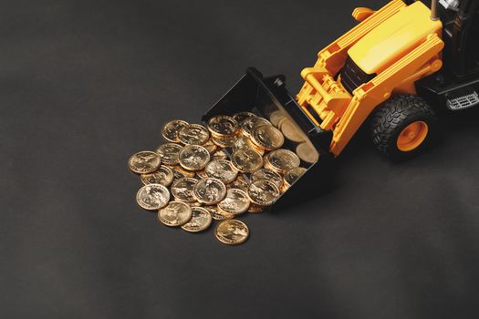backhoe tractor rake up money coins