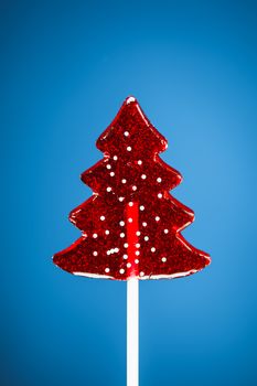 Christmas tree sweet candy, blue background