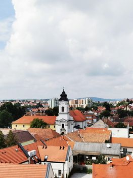A magnificent view from the Castle of Eger. Eger panoramic view of the church and rows of houses High quality photo