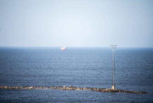 Fishing trawler in the blue sea in the Gulf of Tallinn