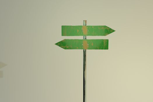 3d rendering , Blank directional road signs , green metal arrows on the signpost. Warm toned colors. Old style image , space for text