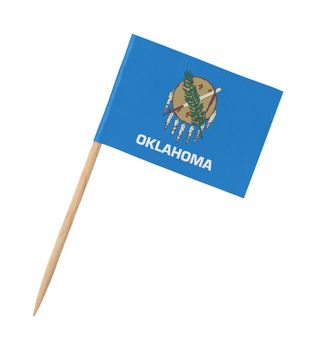 Small paper US-state flag on wooden stick - Oklahoma- Isolated on white