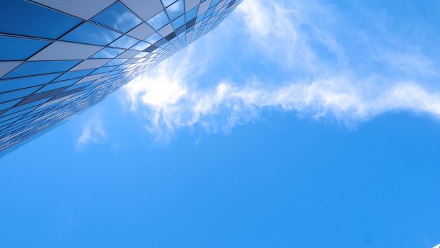 Low angle view images of office hotel and department store modern style building in Sapporo Hokkaido Japan on summer season day with blue clear sky and white cloud.