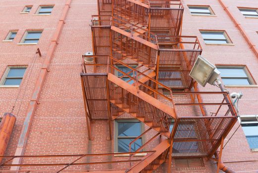 Old style exterior fire escape stairs on buidling in Tulsa, Oklahoma 1USA.