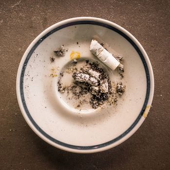 A saucer used as ashtrays.