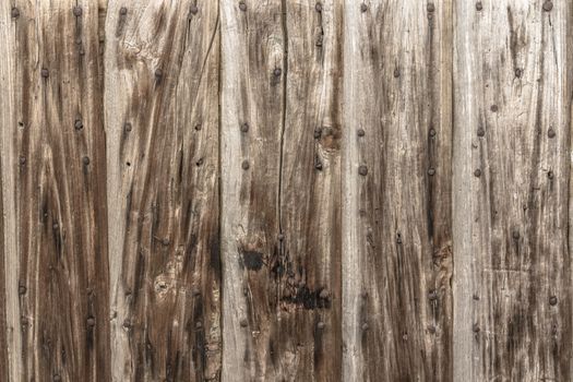 Old panel wood with rusty nails.