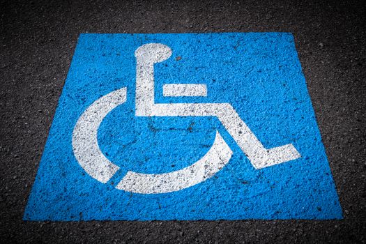 Indication of reserved seat for disabled parking.