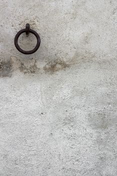Medieval ring on the facade of an old building.