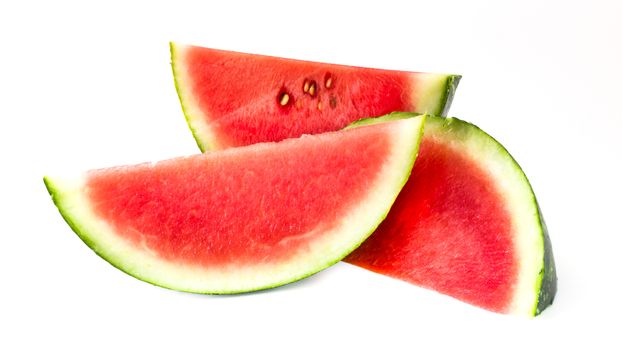 Three slices of ripe watermelon, isolated on white background.