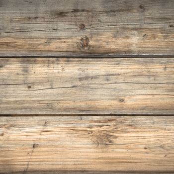 Background characterized by wooden planks rustic and warm hues.