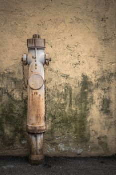 An old fire hydrant still running.