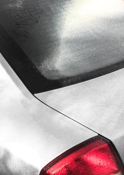 Frozen car during winter day