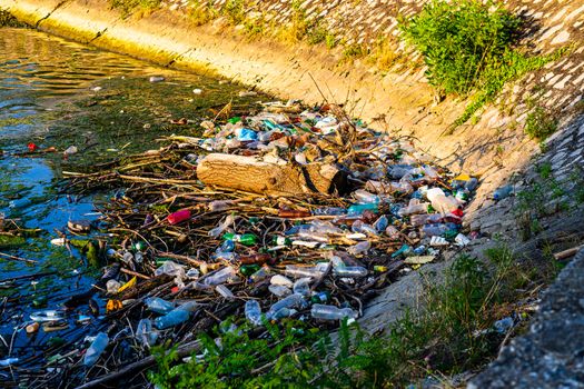 Dirty polluted waste water with garbages. Environment pollution concept. Urban environment issues in Orsova, Romania, 2020