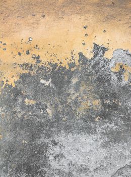 Surface grunge rough and peeling painted of the old dilapidated concrete cement wall. Colors orange and gray. Ideal for concepts and backgrounds.