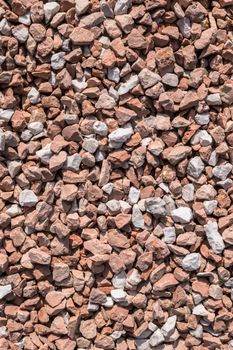 Closeup of little red pebbles. It can be used for texture and background