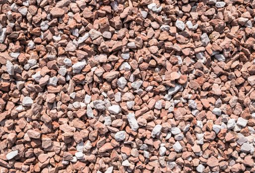 Closeup of little red pebbles. It can be used for texture and background