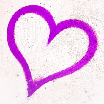 Concept or conceptual painted violet abstract heart shape love symbol, dirty wall background, metaphor to urban and romantic valentine, grungy style.