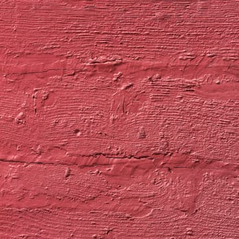 Texture of old rustic wall covered with red stucco for creative backgrounds