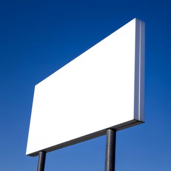 Billboard with empty screen, against blue sky