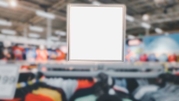 Billboard and white blank screen in blurry at shopping or department store background. Mockup shopping.