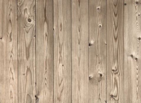 Background of wooden planks, with light shades and natural.
