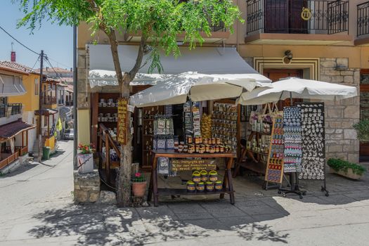Day summer view of local gift shops without customers at Athytos village, Kassandra peninsula.