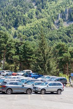 Escaldes Engodany, Andorra : 20 August 2020 : Cars parked in the Engolasters lake parking in Escaldes Engordany, Andorra in summer 2020