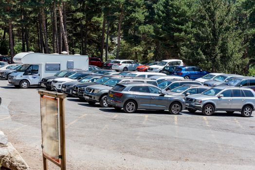 Escaldes Engodany, Andorra : 20 August 2020 : Cars parked in the Engolasters lake parking in Escaldes Engordany, Andorra in summer 2020