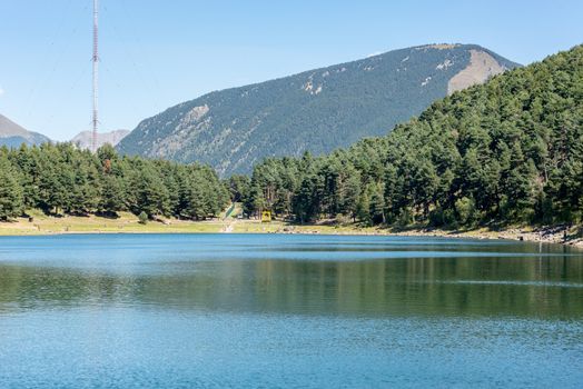 Summer afternoon at Lake Engolasters in the Pyrenees. Escaldes Engordany, Andorra.