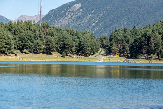 Escaldes Engodany, Andorra : 20 August 2020 : Tourists enjoying the Summer Afternoon at Lake Engolasters in the Pyrenees. Escaldes Engordany, Andorra in summer 2020