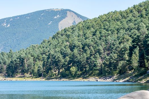 Summer afternoon at Lake Engolasters in the Pyrenees. Escaldes Engordany, Andorra.