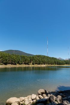 Summer afternoon at Lake Engolasters in the Pyrenees. Escaldes Engordany, Andorra.