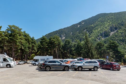 Escaldes Engodany, Andorra : 20 August 2020 : Cars parked in the Engolasters lake parking in Escaldes Engordany, Andorra in summer 2020