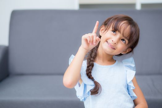 Portrait of beautiful kid, child gesture cheerful, girl with expression happiness.