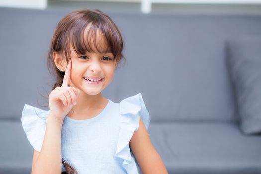 Portrait of beautiful kid, child gesture cheerful, girl with expression happiness.
