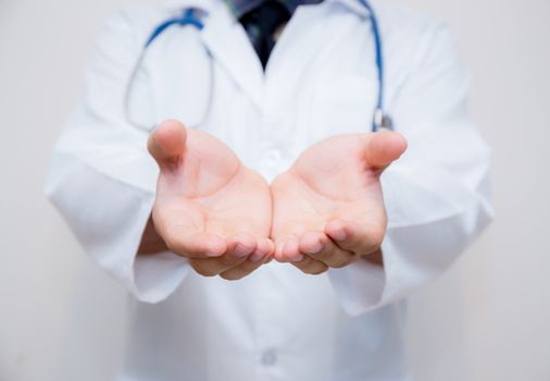 Doctor lman hand with something isolated on white background.
