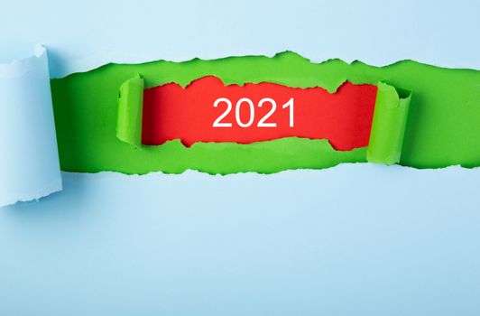 Vision 2021 goal written behind a torn paper.