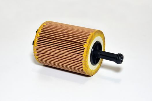 Car oil filter cartridge on white background