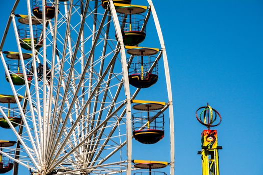 Bergen, Norway, May 2014: close-up and detail of colorful ferris wheel on blue sky