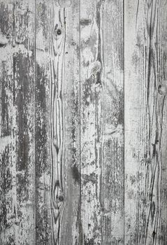 Rustic wooden planks background with peeling white paint