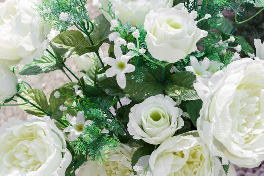 Flower plastic bouquet. Fake flowes.