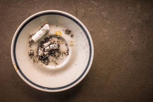 A saucer used as ashtrays.