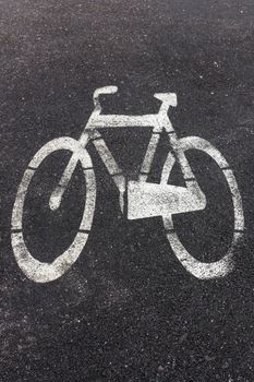Symbol of bike path imprinted on the asphalt