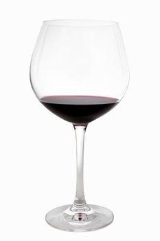Vertical shot of a glass of red wine on white background.