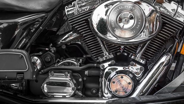 Jesolo (VE), ITALY - July 29, 2017: Motorcycle Harley Davidson. Motorcycle tank and engine's details.