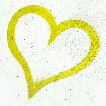 Concept or conceptual painted lime green abstract heart shape love symbol, dirty wall background, metaphor to urban and romantic valentine, grungy style.