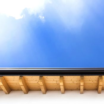 Roof with wood rafters and planks. Italian house.