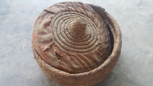 Closeup view of changair (Breadben) is Pakistani traditional household handicrafts used for keeping chapati or roti or bread hot and warm for longer time. CHANGAIR PAKISTANI HANDICRAFTS